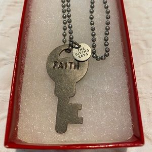 The Giving Keys Necklace! This one has the word “Faith” on it and it is silver!